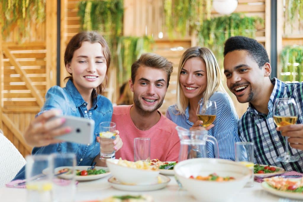 Group of four cheerful